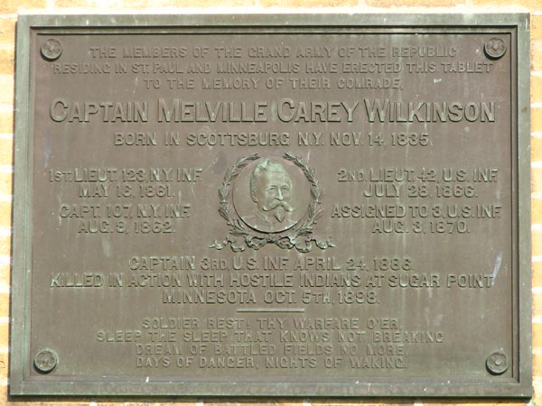 Plaque commemorating Captain Melville Carey Wilkinson who was killed at the battle of Sugar Point in 1898, placed on the front of the abandoned HQ building at Ft. Snelling.